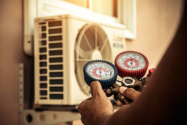 Professional Heat Pump Repair technician working in Hiawatha, IA